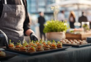 Caterer placing tray of party food